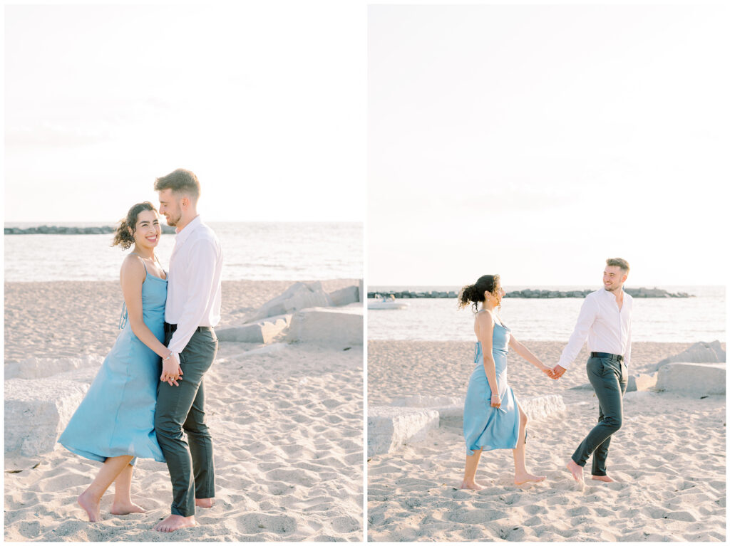 Couple walking for engagement photos at New Buffalo Beach, Michigan