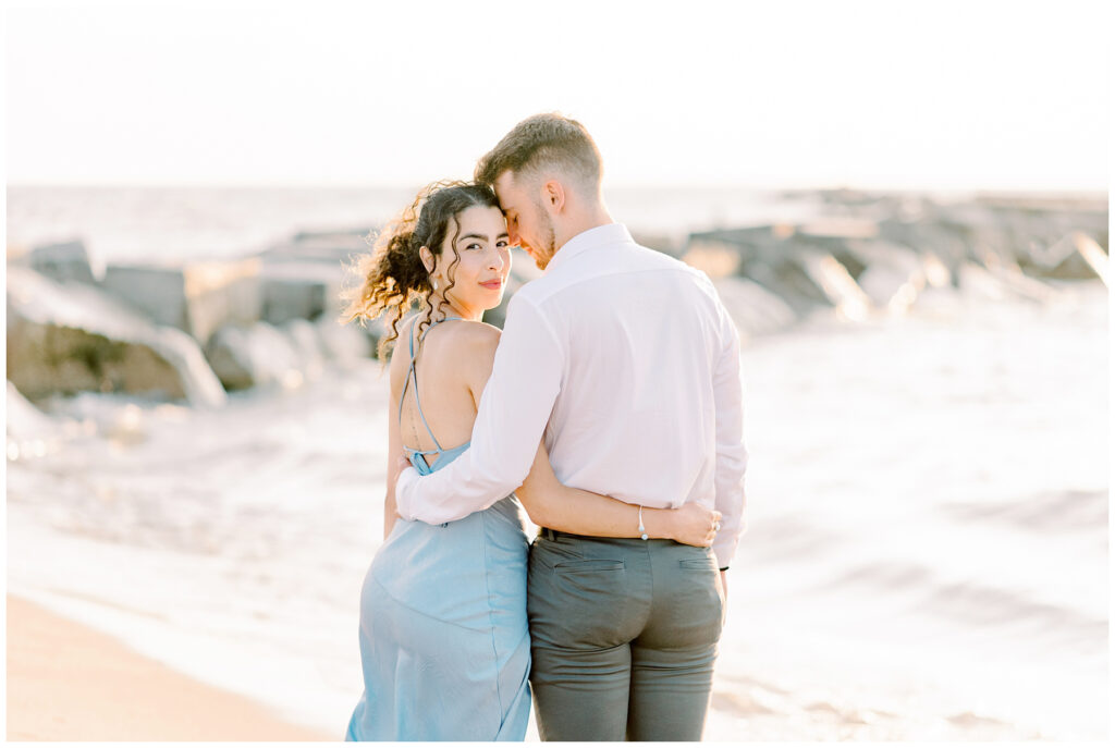 Engagement Photos on Lake Michigan with Rocks in Background
