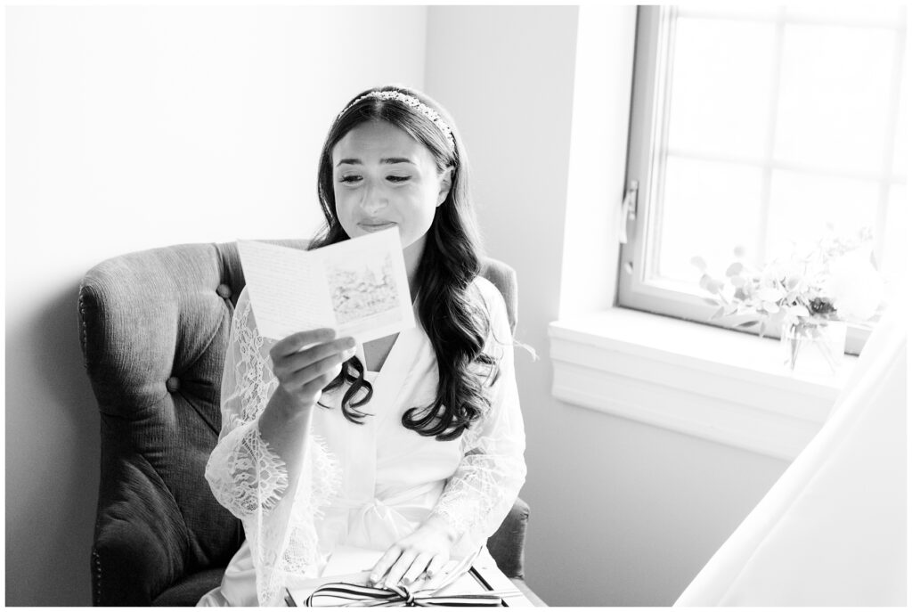 Bride reading card from groom
