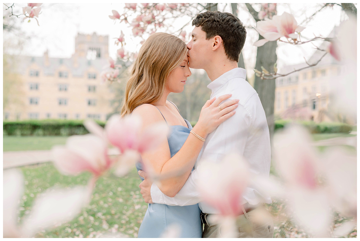 A couple embraces in one of the best places to take engagement photos in South Bend