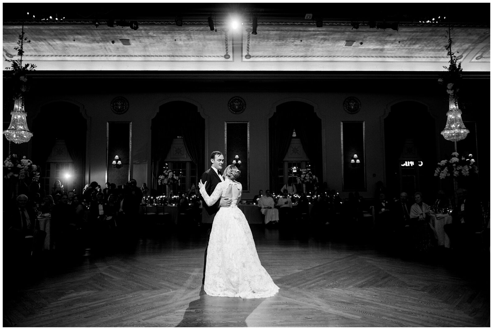 A bride and groom have their first dance during their Notre Dame wedding reception.