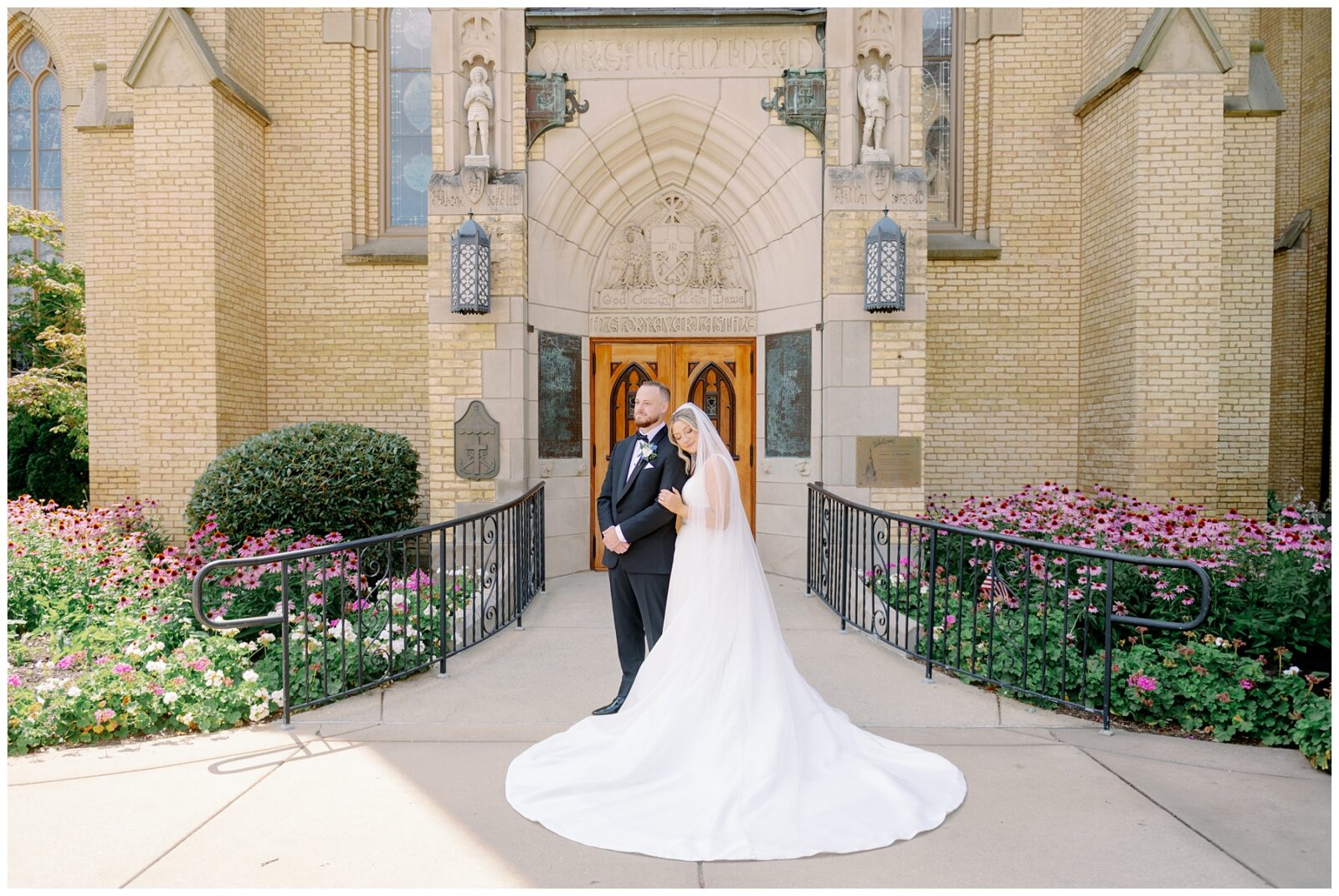 Bride and groom portrait outside the Basilica of the Sacred Heart God, Country, Notre Dame Doors