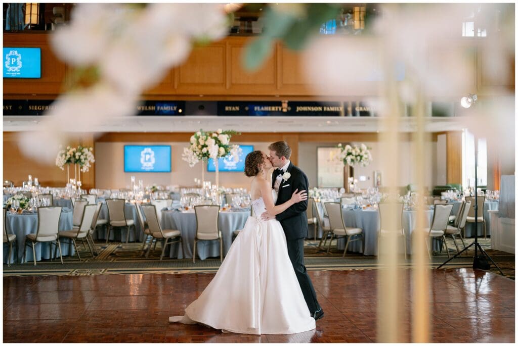 Bride and groom sharing their first dance inside Dahnke Ballroom at Notre Dame.